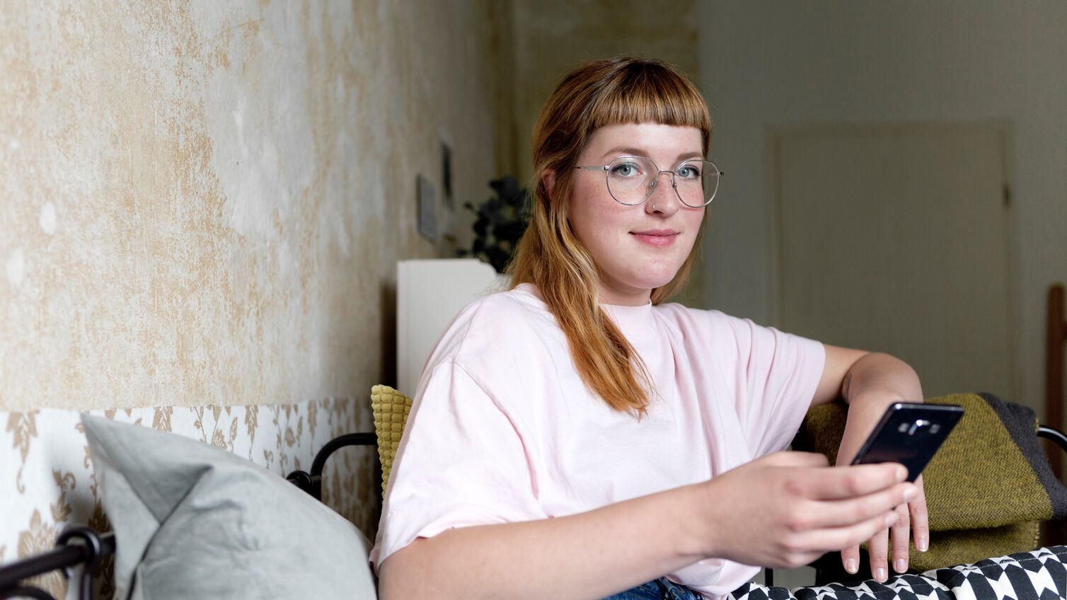 Female student using smartphone