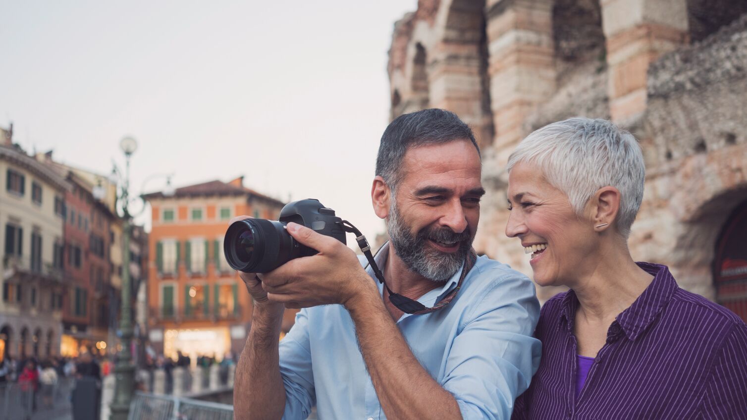 Mature couple as tourist in city Verona