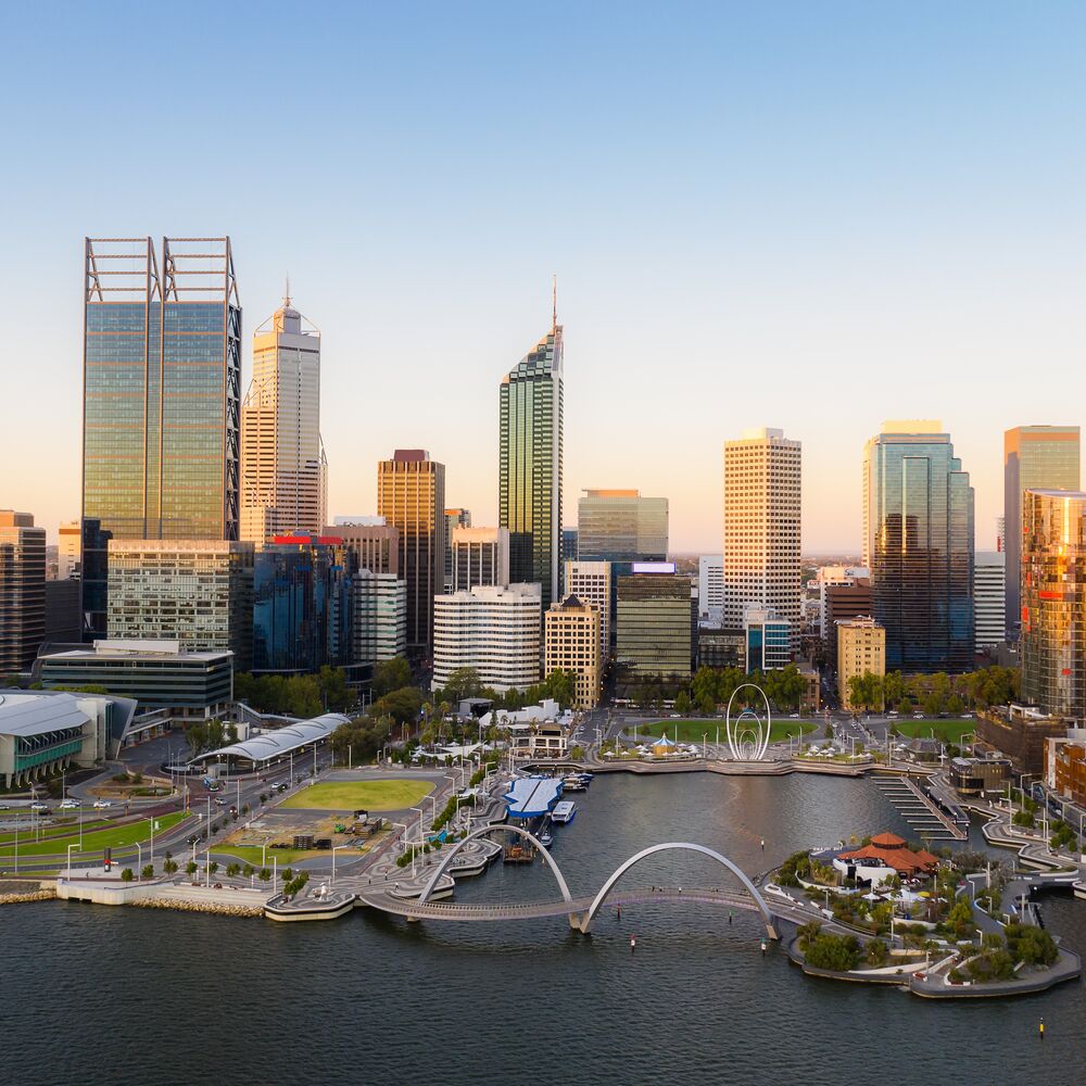 Aerial view of Elizabeth Quay waterfront during sunset in Perth, Western Australia state, Australia.