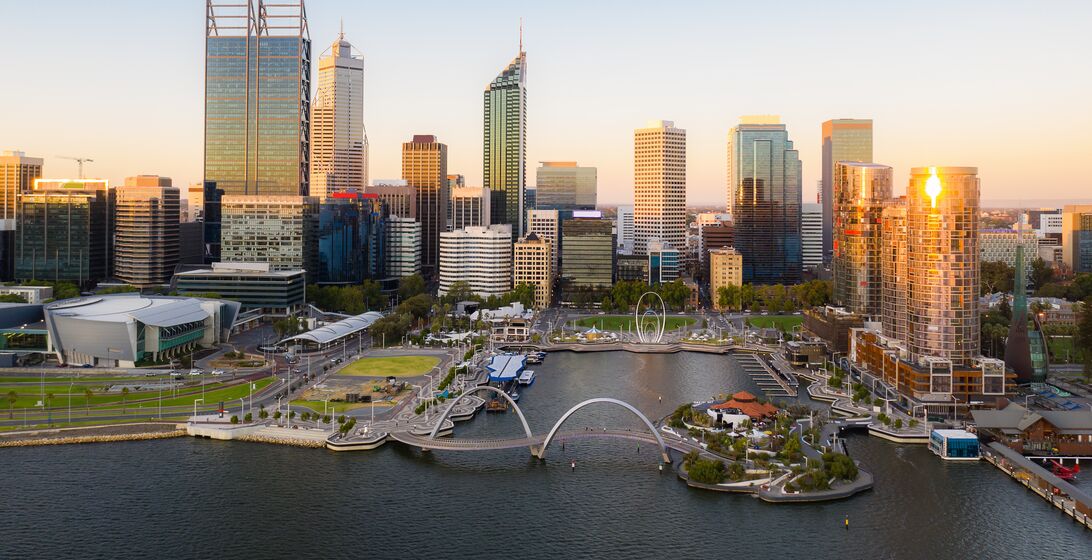 Aerial view of Elizabeth Quay waterfront during sunset in Perth, Western Australia state, Australia.