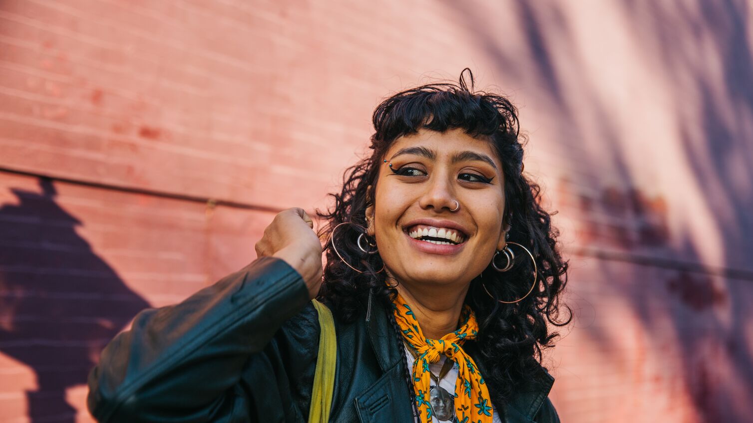 educator, artist, queer, friend, sister, Leo, person of color, goofy, happy, confused, strong, warm, exuberant, light, energetic, loved