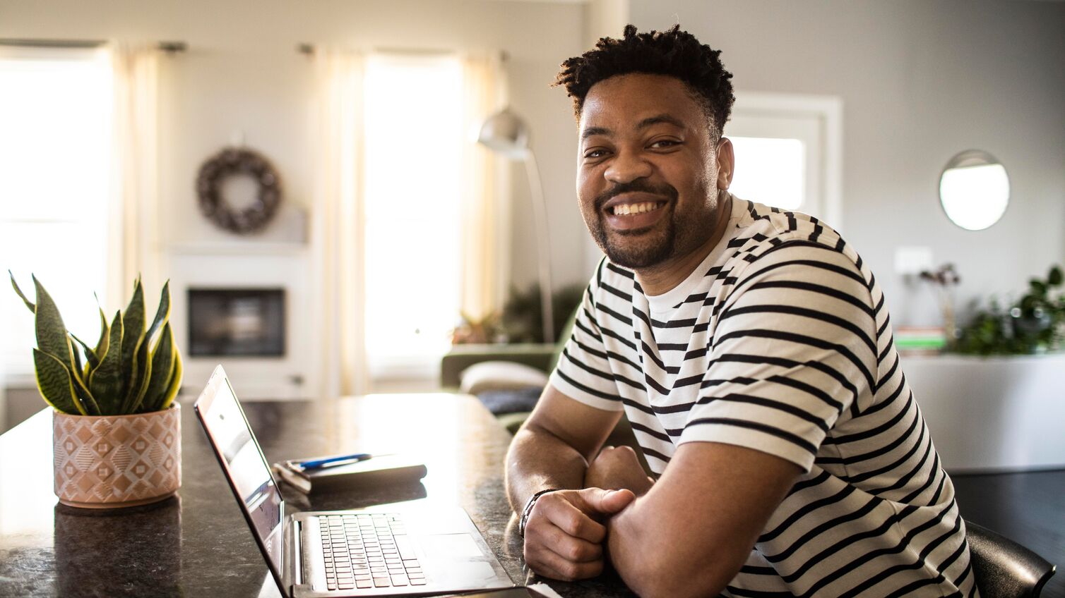 Mother helping young girl walk in her high heels