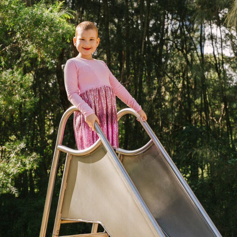 Helping kids with cancer access care and families stay together.