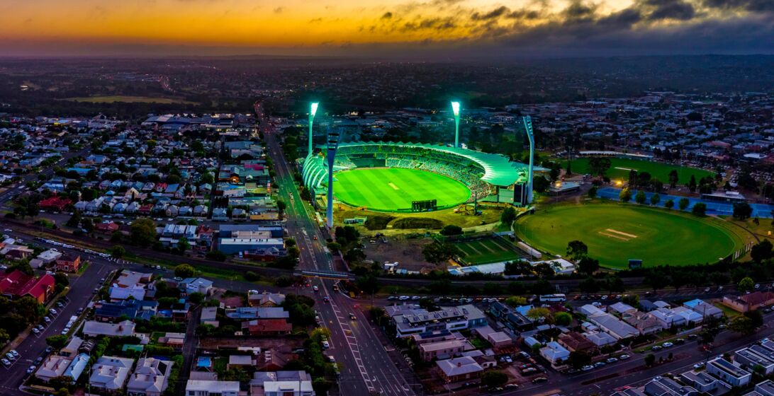 Skyline view of Geelong stadium at sunset