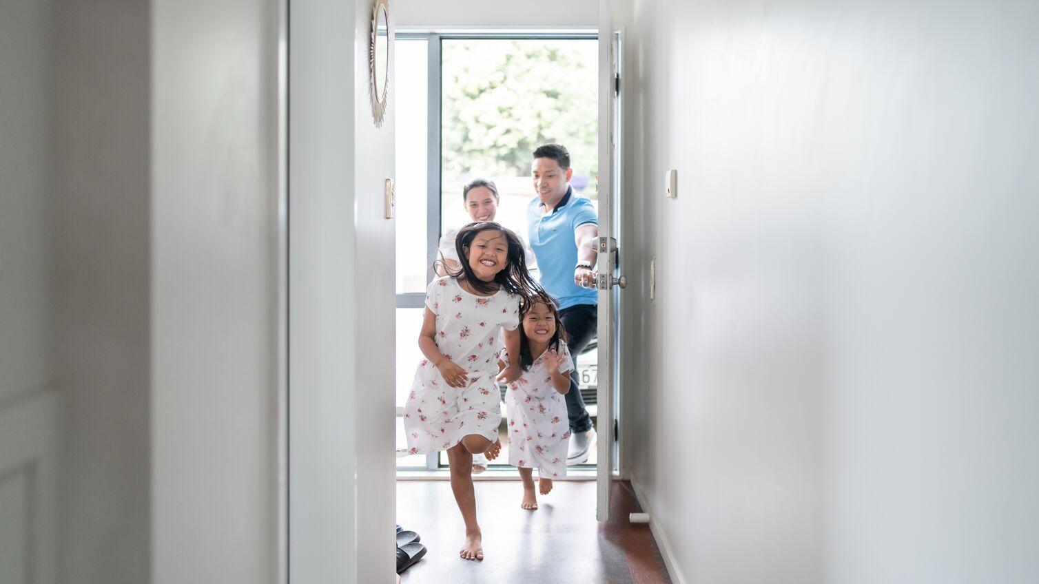 Two sisters one younger and other older are very happy to arrived at new home in Auckland, New Zealand.