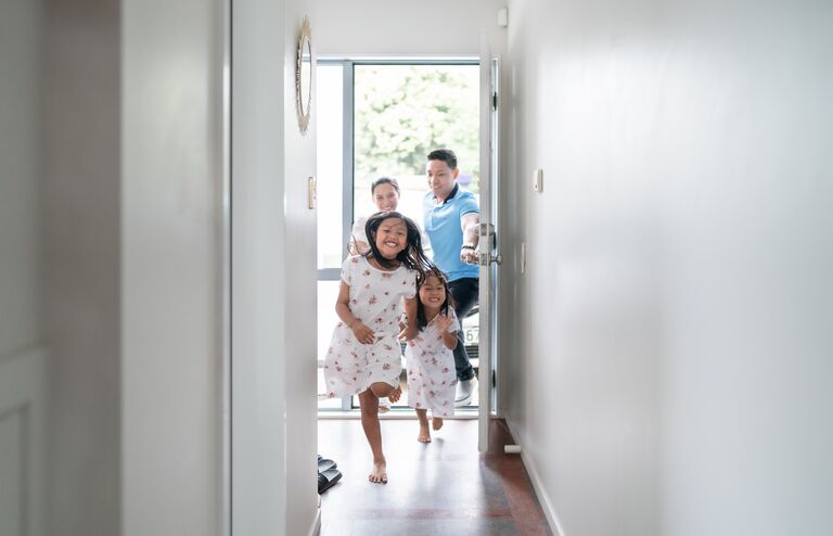 Two sisters one younger and other older are very happy to arrived at new home in Auckland, New Zealand.